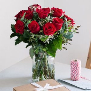 Love of 12 Red Roses In A Vase