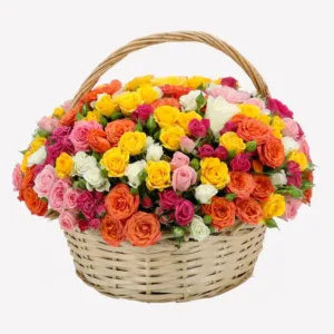 The image conveys a sense of cheerfulness, abundance, and natural beauty. The vibrant colors of the roses, combined with the rustic charm of the woven basket