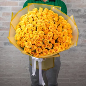a large bouquet of bright yellow roses