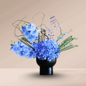 Blue Hydrangea and Delphinium with artificial phalaenopsis arrangement